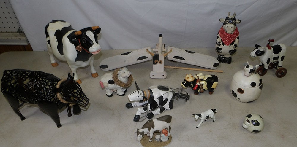 Lot of Cow Figures & Decorations: Lot of Cow Figures & Decorations. Up to 10 1/2" H 14 1/2" W 5" D ALL DESCRIPTIONS AND ANY CONDITION STATEMENT GIVEN BY LANGSTON AUCTION GALLERY ARE STRICTLY OPINIONS AND LANGSTON'S SHALL HAVE NO RESPO