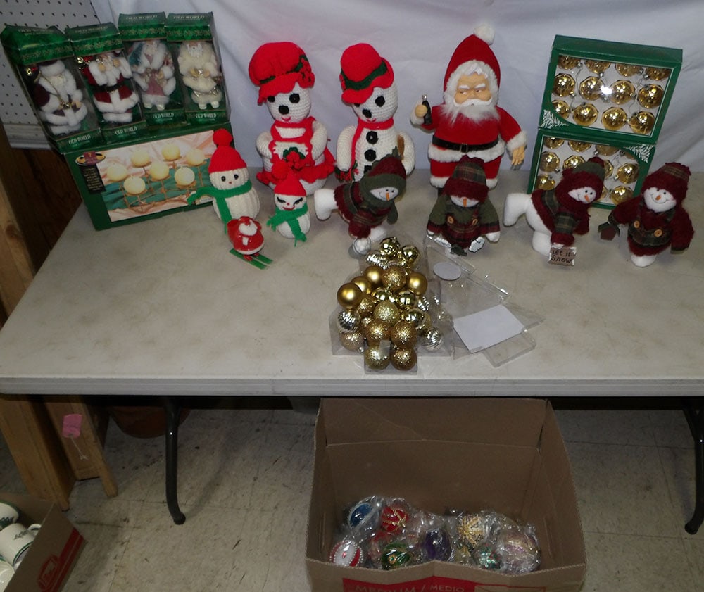 Lot of Christmas Decorations: Lot of Christmas Decorations. Up to 14 1/2" H 6" W 3 1/2" D ALL DESCRIPTIONS AND ANY CONDITION STATEMENT GIVEN BY LANGSTON AUCTION GALLERY ARE STRICTLY OPINIONS AND LANGSTON'S SHALL HAVE NO RESPONSIBI