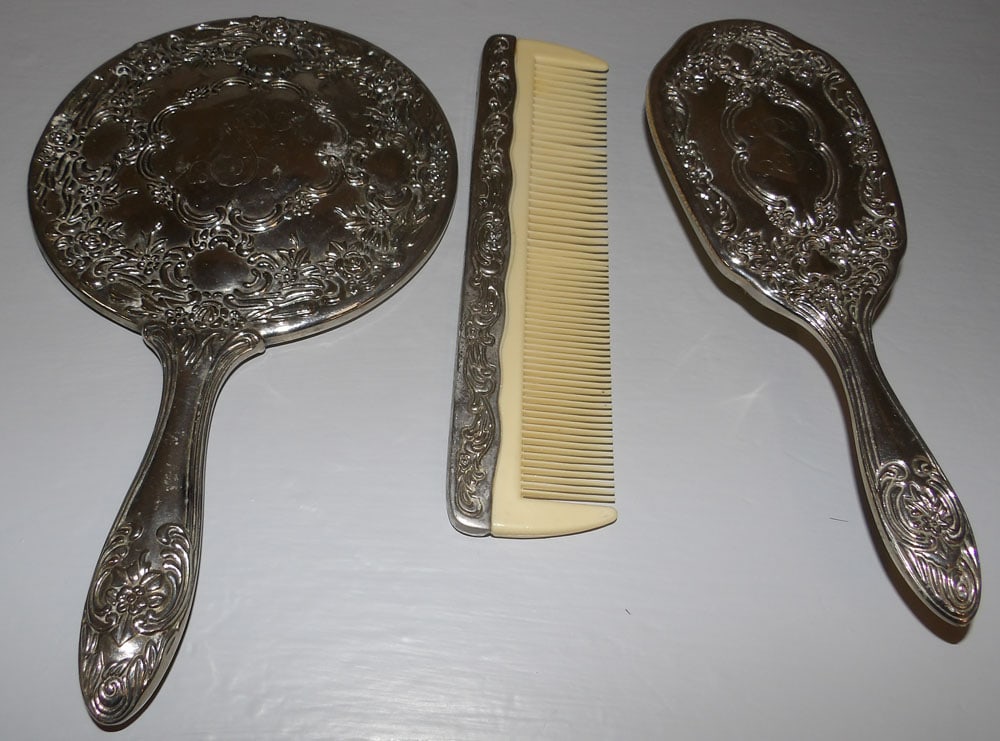 Silverplated Dresser Set: Silverplated Dresser Set. Up to 9 1/2" x 5 1/2" ALL DESCRIPTIONS AND ANY CONDITION STATEMENT GIVEN BY LANGSTON AUCTION GALLERY ARE STRICTLY OPINIONS AND LANGSTON'S SHALL HAVE NO RESPONSIBILITY FOR ERR