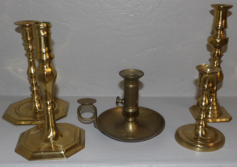 Lot of Brass Candlesticks: Lot of Brass Candlesticks . Up to 7 1/2" H 4 1/4" Dia. ALL DESCRIPTIONS AND ANY CONDITION STATEMENT GIVEN BY LANGSTON AUCTION GALLERY ARE STRICTLY OPINIONS AND LANGSTON'S SHALL HAVE NO RESPONSIBILITY