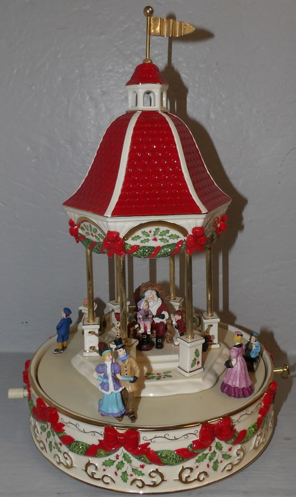 Lenox Porcelain Christmas Music Carousel: Lenox Porcelain Christmas Music Carousel . 13 3/4" H 9" Dia. ALL DESCRIPTIONS AND ANY CONDITION STATEMENT GIVEN BY LANGSTON AUCTION GALLERY ARE STRICTLY OPINIONS AND LANGSTON'S SHALL HAVE NO RESPONSIB