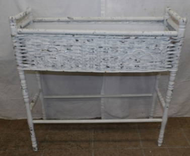 Antique Painted Wicker Planter: Antique Painted Wicker Planter . 30 3/4" H 30 1/2" W 10 1/2" D ALL DESCRIPTIONS AND ANY CONDITION STATEMENT GIVEN BY LANGSTON AUCTION GALLERY ARE STRICTLY OPINIONS AND LANGSTON'S SHALL HAVE NO RESPONS
