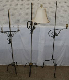 Three Painted Wrought Iron Floor Lamps: Three Painted Wrought Iron Floor Lamps. Up to 62 1/2" H 16 1/2" Dia. ALL DESCRIPTIONS AND ANY CONDITION STATEMENT GIVEN BY LANGSTON AUCTION GALLERY ARE STRICTLY OPINIONS AND LANGSTON'S SHALL HAVE NO R