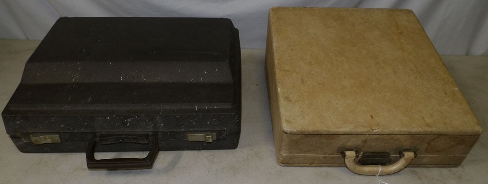 Two Vintage Typewriters: Two Vintage Typewriters . 15" H 18 1/2" W 6 1/2" D ALL DESCRIPTIONS AND ANY CONDITION STATEMENT GIVEN BY LANGSTON AUCTION GALLERY ARE STRICTLY OPINIONS AND LANGSTON'S SHALL HAVE NO RESPONSIBILITY FOR