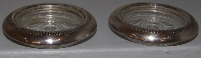 Two Sterling Rim Glass Coasters