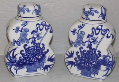 Pair of Chinese Blue & White Porcelain Covered Bottles with Floral & Butterfly Motif