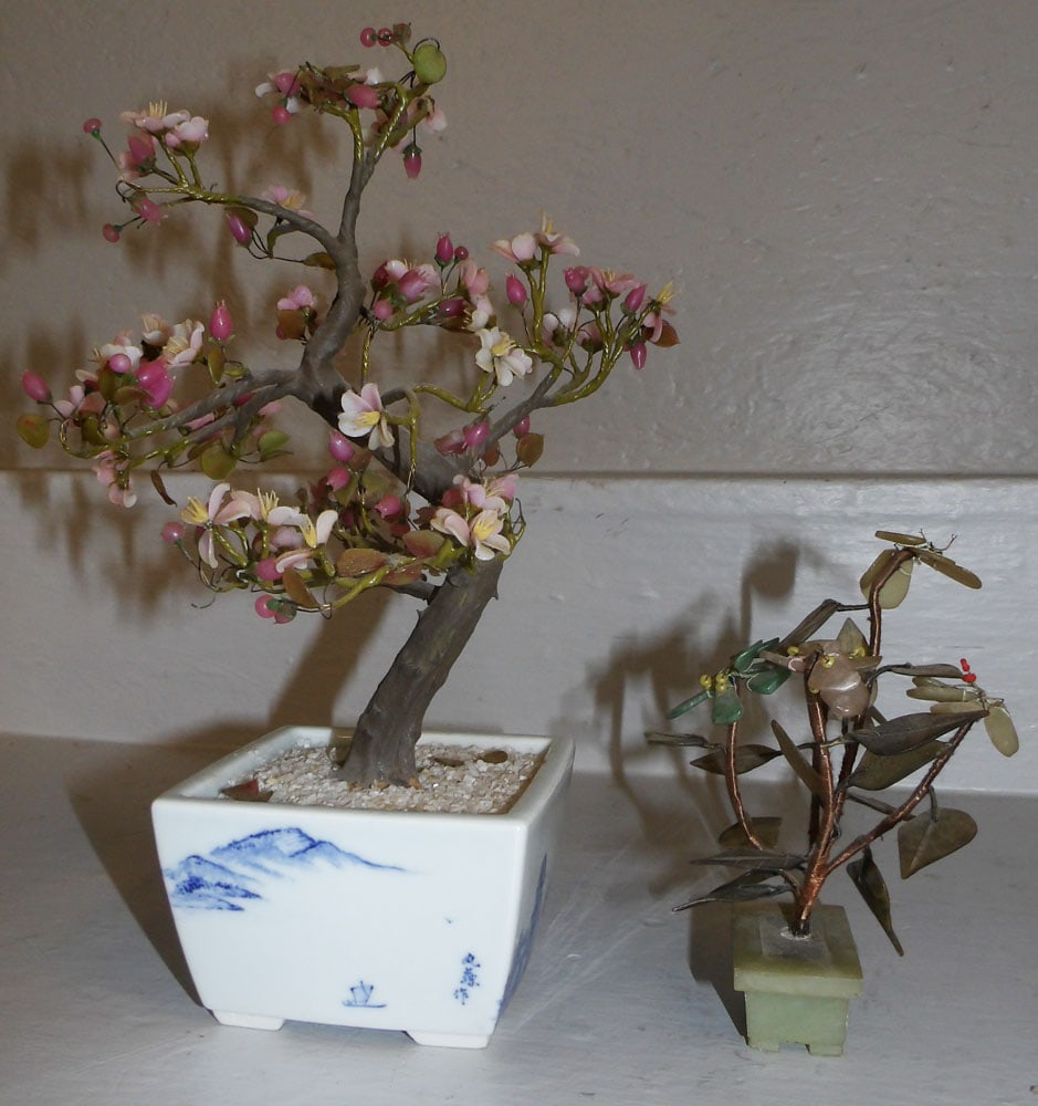Two Oriental Stone Plants, (One in Blue & White Jardiniere): Two Oriental Stone Plants, (One in Blue & White Jardiniere). 10 3/4" H 6" Dia. ALL DESCRIPTIONS AND ANY CONDITION STATEMENT GIVEN BY LANGSTON AUCTION GALLERY ARE STRICTLY OPINIONS AND LANGSTON'S SHALL