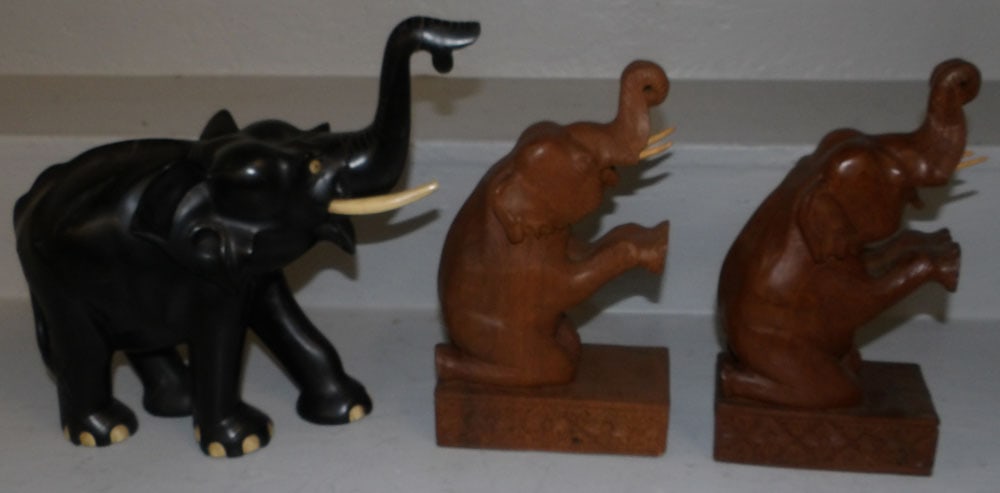 Pair of Teak Wood Elephant Bookends & Ebony & Bone Carved Elephant: Pair of Teak Wood Elephant Bookends & Ebony & Bone Carved Elephant. Up to 11" H 11" W 5" D ALL DESCRIPTIONS AND ANY CONDITION STATEMENT GIVEN BY LANGSTON AUCTION GALLERY ARE STRICTLY OPINIONS AND LANG