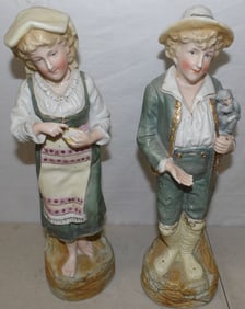 Pair of Bisque Porcelain Figurines