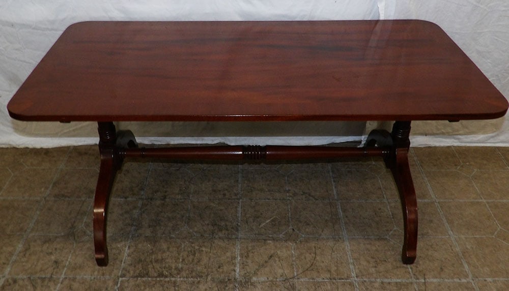 Mahogany Banded Top Tea Table: Mahogany Banded Top Tea Table . 19" H 42" W 20 3/4" D ALL DESCRIPTIONS AND ANY CONDITION STATEMENT GIVEN BY LANGSTON AUCTION GALLERY ARE STRICTLY OPINIONS AND LANGSTON'S SHALL HAVE NO RESPONSIBILITY F