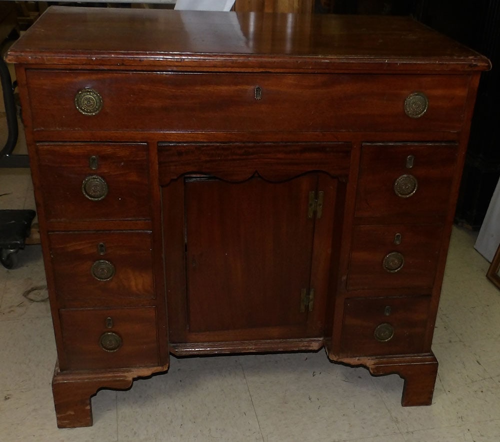 19th Century Mahogany Kneehole Desk: 19th Century Mahogany Kneehole Desk. 31 1/2" H 33" W 18" D ALL DESCRIPTIONS AND ANY CONDITION STATEMENT GIVEN BY LANGSTON AUCTION GALLERY ARE STRICTLY OPINIONS AND LANGSTON'S SHALL HAVE NO RESPONSIBIL