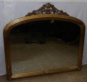 Antique Gilded Frame Over the Mantel Mirror