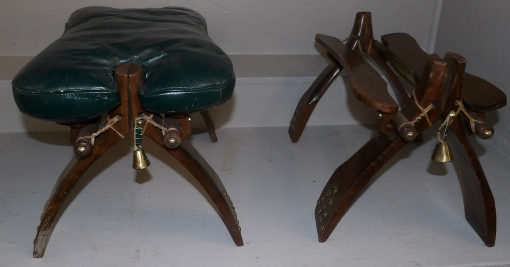 Two Walnut Folding Camel Seats: Two Walnut Folding Camel Seats. 15" H 23" W 14" D ALL DESCRIPTIONS AND ANY CONDITION STATEMENT GIVEN BY LANGSTON AUCTION GALLERY ARE STRICTLY OPINIONS AND LANGSTON'S SHALL HAVE NO RESPONSIBILITY FOR E