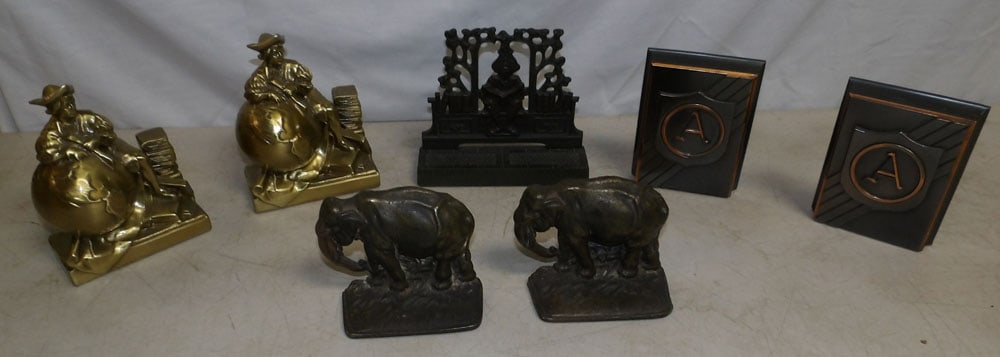 Lot of Metal Bookends: Lot of Metal Bookends . Up to 6" H 7" W 2" D ALL DESCRIPTIONS AND ANY CONDITION STATEMENT GIVEN BY LANGSTON AUCTION GALLERY ARE STRICTLY OPINIONS AND LANGSTON'S SHALL HAVE NO RESPONSIBILITY FOR ERRORS