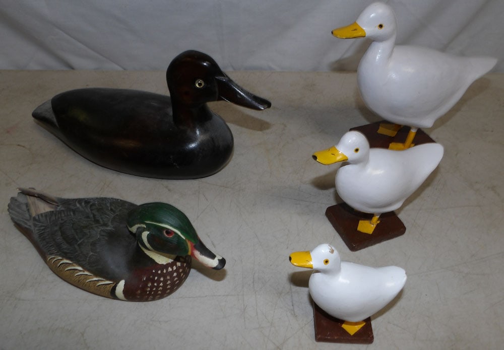 Lot of Wooden Ducks: Lot of Wooden Ducks . Up to 5 1/2" H 9 1/2" W 7" D ALL DESCRIPTIONS AND ANY CONDITION STATEMENT GIVEN BY LANGSTON AUCTION GALLERY ARE STRICTLY OPINIONS AND LANGSTON'S SHALL HAVE NO RESPONSIBILITY FOR 
