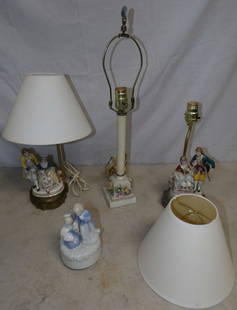 Lot of Porcelain Figural Lamps: Lot of Porcelain Figural Lamps. Up to 22" H 3 1/2" Dia. ALL DESCRIPTIONS AND ANY CONDITION STATEMENT GIVEN BY LANGSTON AUCTION GALLERY ARE STRICTLY OPINIONS AND LANGSTON'S SHALL HAVE NO RESPONSIBILITY