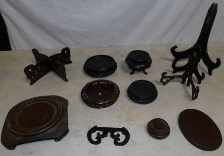 Lot of Oriental Teakwood Stands: Lot of Oriental Teakwood Stands . Up to 10" H 5 1/2" Dia. ALL DESCRIPTIONS AND ANY CONDITION STATEMENT GIVEN BY LANGSTON AUCTION GALLERY ARE STRICTLY OPINIONS AND LANGSTON'S SHALL HAVE NO RESPONSIBILI