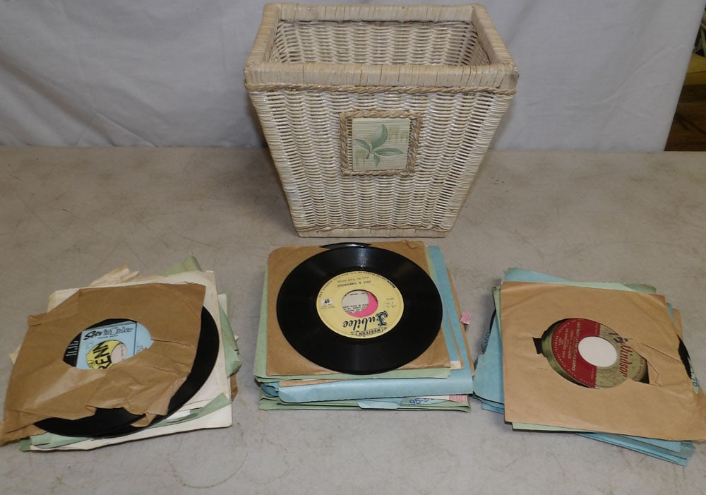 Lot of Records & Wicker Basket: Lot of Records & Wicker Basket. Up to 7" W ALL DESCRIPTIONS AND ANY CONDITION STATEMENT GIVEN BY LANGSTON AUCTION GALLERY ARE STRICTLY OPINIONS AND LANGSTON'S SHALL HAVE NO RESPONSIBILITY FOR ERRORS O