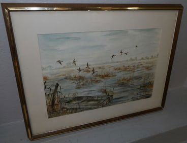 framed water color of duck flying over water signed by the artist dated 1967
