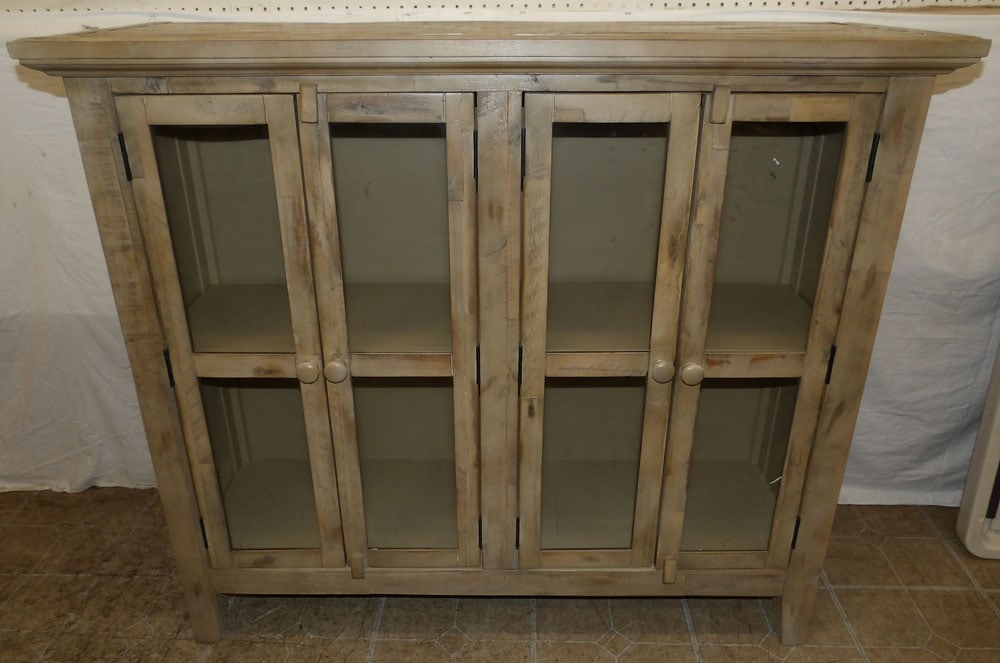 bleach wood and glass door modern farm style cabinet: bleach wood and glass door modern farm style cabinet . 42 1/4" H 48 1/4" W 15" D ALL DESCRIPTIONS AND ANY CONDITION STATEMENT GIVEN BY LANGSTON AUCTION GALLERY ARE STRICTLY OPINIONS AND LANGSTON'S SHA