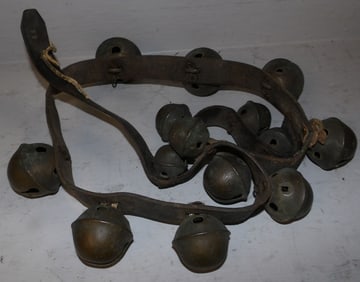 antique brass and leather strap sleigh bells