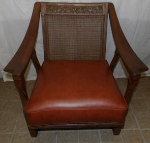 oak and faux leather mid century modern arm chair with cane back