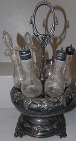 silver plated and glass bottle cruet stand