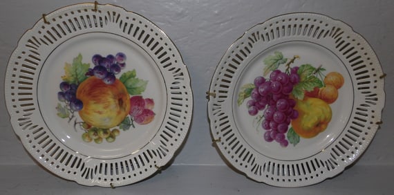 pair of handpainted porcelain open work German plates