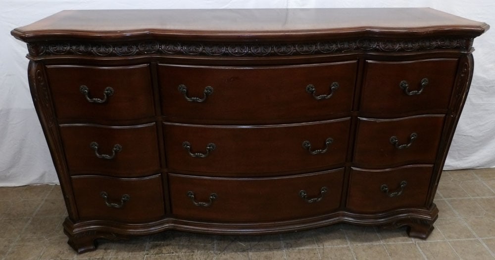 cherry banded top 9 drawer dresser: cherry banded top 9 drawer dresser . 38 1/4" H 66 1/2" W 19 1/2" D ALL DESCRIPTIONS AND ANY CONDITION STATEMENT GIVEN BY LANGSTON AUCTION GALLERY ARE STRICTLY OPINIONS AND LANGSTON'S SHALL HAVE NO RES
