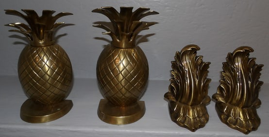 one pair of brass pineapple and pair of gilded metal book ends