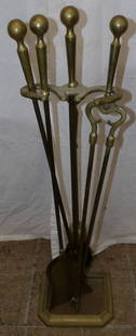 set of brass fireplace tools: set of brass fireplace tools. 29 1/2" H ALL DESCRIPTIONS AND ANY CONDITION STATEMENT GIVEN BY LANGSTON AUCTION GALLERY ARE STRICTLY OPINIONS AND LANGSTON'S SHALL HAVE NO RESPONSIBILITY FOR ERRORS OR O