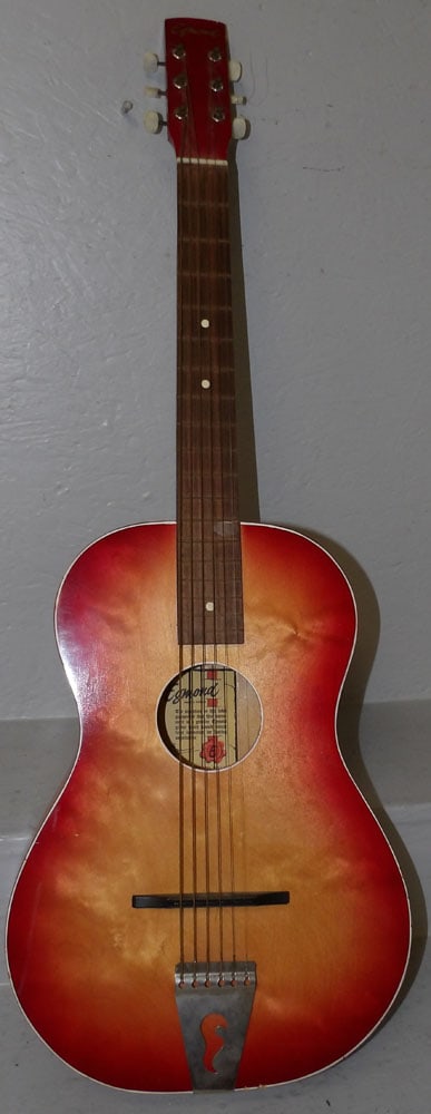 Vintage Egmond Guitar: Vintage Egmond Guitar. 37" L 12 1/2" D ALL DESCRIPTIONS AND ANY CONDITION STATEMENT GIVEN BY LANGSTON AUCTION GALLERY ARE STRICTLY OPINIONS AND LANGSTON'S SHALL HAVE NO RESPONSIBILITY FOR ERRORS OR OM