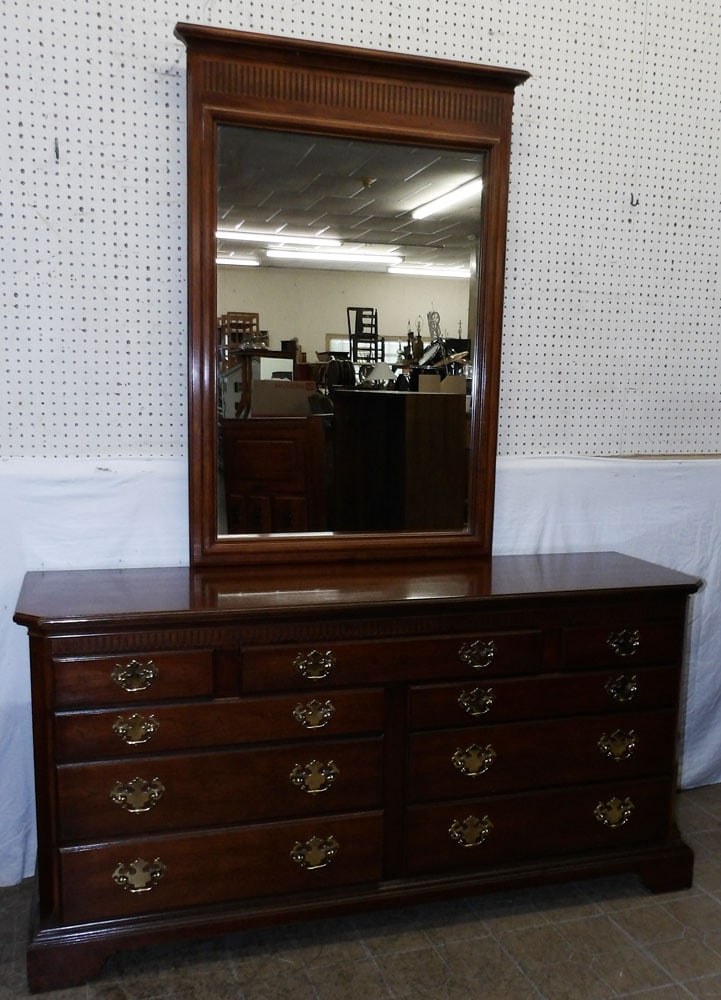 Cherry Nine Drawer Dresser by Hickory: Cherry Nine Drawer Dresser by Hickory . 82 1/4" H 63" W 19" D ALL DESCRIPTIONS AND ANY CONDITION STATEMENT GIVEN BY LANGSTON AUCTION GALLERY ARE STRICTLY OPINIONS AND LANGSTON'S SHALL HAVE NO RESPONSI