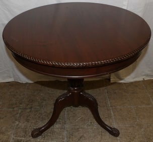 carved mahogany drum table