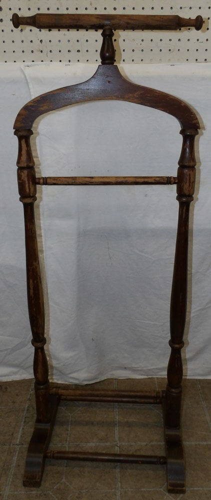 mahogany valet: mahogany valet . 46 1/2" H 17 1/2" W 14 1/2" D ALL DESCRIPTIONS AND ANY CONDITION STATEMENT GIVEN BY LANGSTON AUCTION GALLERY ARE STRICTLY OPINIONS AND LANGSTON'S SHALL HAVE NO RESPONSIBILITY FOR ERRO