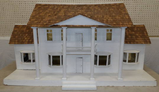 painted wood doll house: painted wood doll house . 31" H 55 1/2" W 23" D ALL DESCRIPTIONS AND ANY CONDITION STATEMENT GIVEN BY LANGSTON AUCTION GALLERY ARE STRICTLY OPINIONS AND LANGSTON'S SHALL HAVE NO RESPONSIBILITY FOR ERR