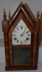 antique walnut steeple clock by Waterbury clock company