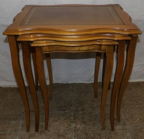 oak and tooled leather top nesting tables