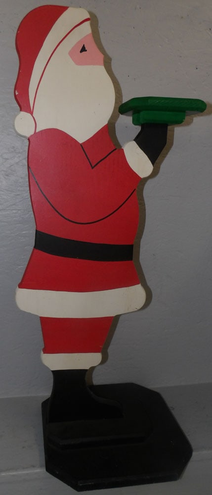 Painted Wood Santa Claus Butler Stand: Painted Wood Santa Claus Butler Stand . 32" H 11 1/4" Dia. ALL DESCRIPTIONS AND ANY CONDITION STATEMENT GIVEN BY LANGSTON AUCTION GALLERY ARE STRICTLY OPINIONS AND LANGSTON'S SHALL HAVE NO RESPONSIBIL