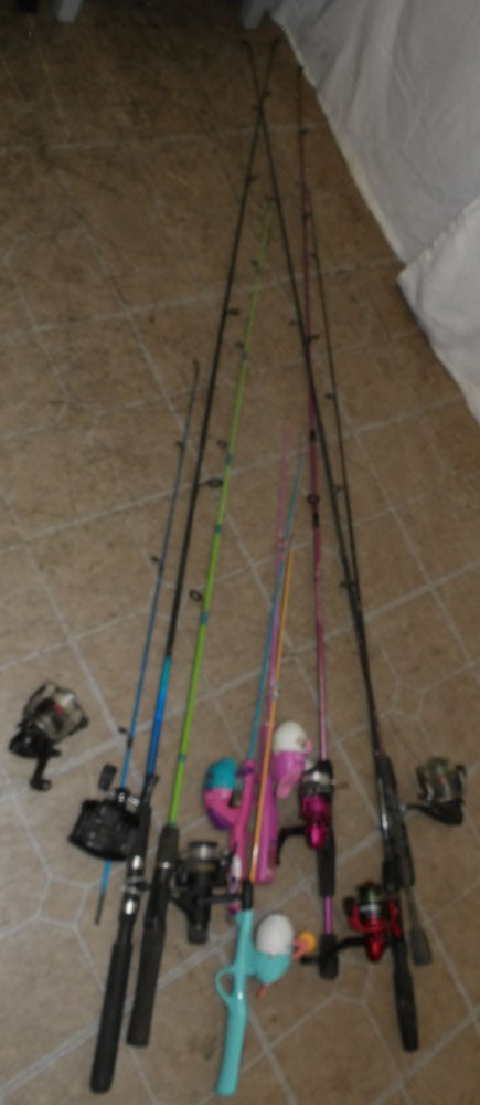 Lot of Fishing Rods: Lot of Fishing Rods . Up to 70" L ALL DESCRIPTIONS AND ANY CONDITION STATEMENT GIVEN BY LANGSTON AUCTION GALLERY ARE STRICTLY OPINIONS AND LANGSTON'S SHALL HAVE NO RESPONSIBILITY FOR ERRORS OR OMISSIO