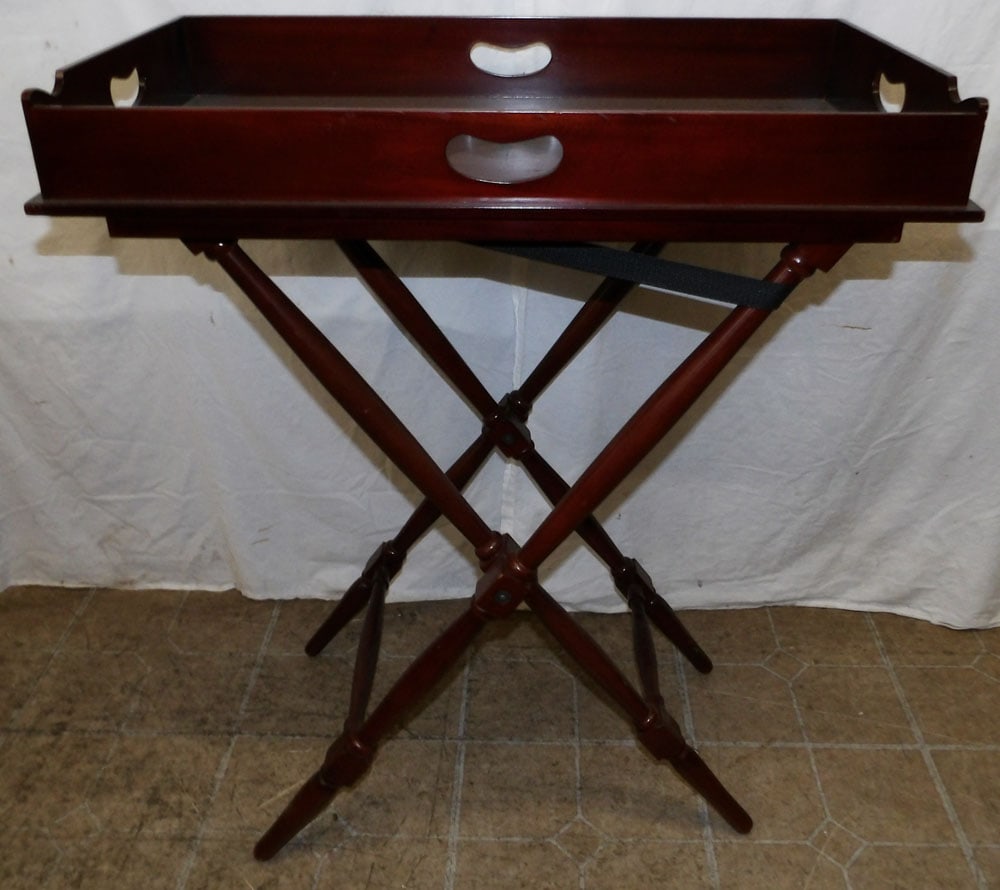Mahogany Butlers Tray with Stand: Mahogany Butlers Tray with Stand . 34" H 29" W 16 1/2" D ALL DESCRIPTIONS AND ANY CONDITION STATEMENT GIVEN BY LANGSTON AUCTION GALLERY ARE STRICTLY OPINIONS AND LANGSTON'S SHALL HAVE NO RESPONSIBILIT