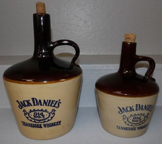 Two Stoneware Whisky Jugs