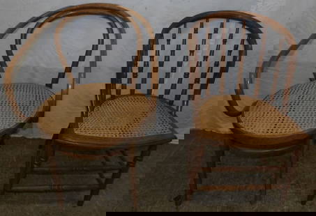 Two Antique Oak & Cane Seat Arm Chairs: Two Antique Oak & Cane Seat Arm Chairs . 31 1/2" H 21" W 22" D ALL DESCRIPTIONS AND ANY CONDITION STATEMENT GIVEN BY LANGSTON AUCTION GALLERY ARE STRICTLY OPINIONS AND LANGSTON'S SHALL HAVE NO RESPONS