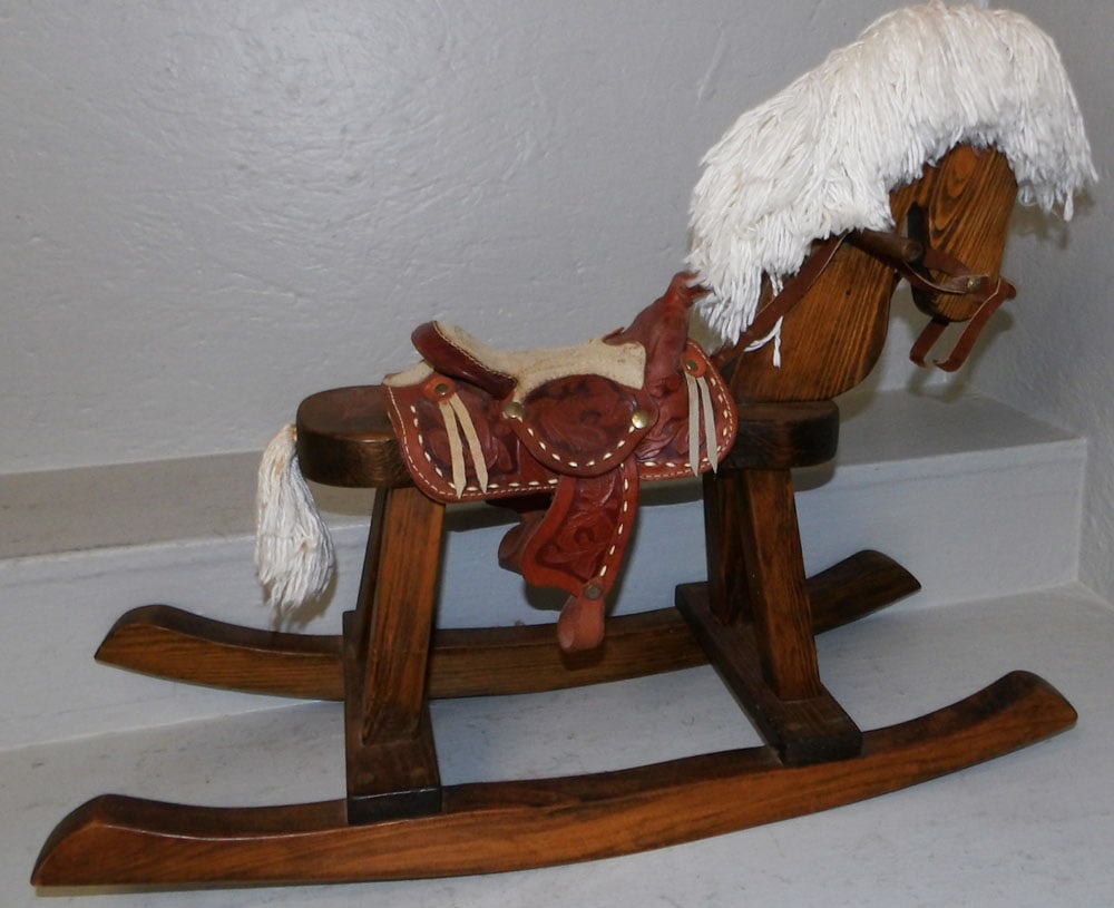 Pine Hobby Horse: Pine Hobby Horse. 20 1/2" H 27" W 10 3/4" D ALL DESCRIPTIONS AND ANY CONDITION STATEMENT GIVEN BY LANGSTON AUCTION GALLERY ARE STRICTLY OPINIONS AND LANGSTON'S SHALL HAVE NO RESPONSIBILITY FOR ERRORS