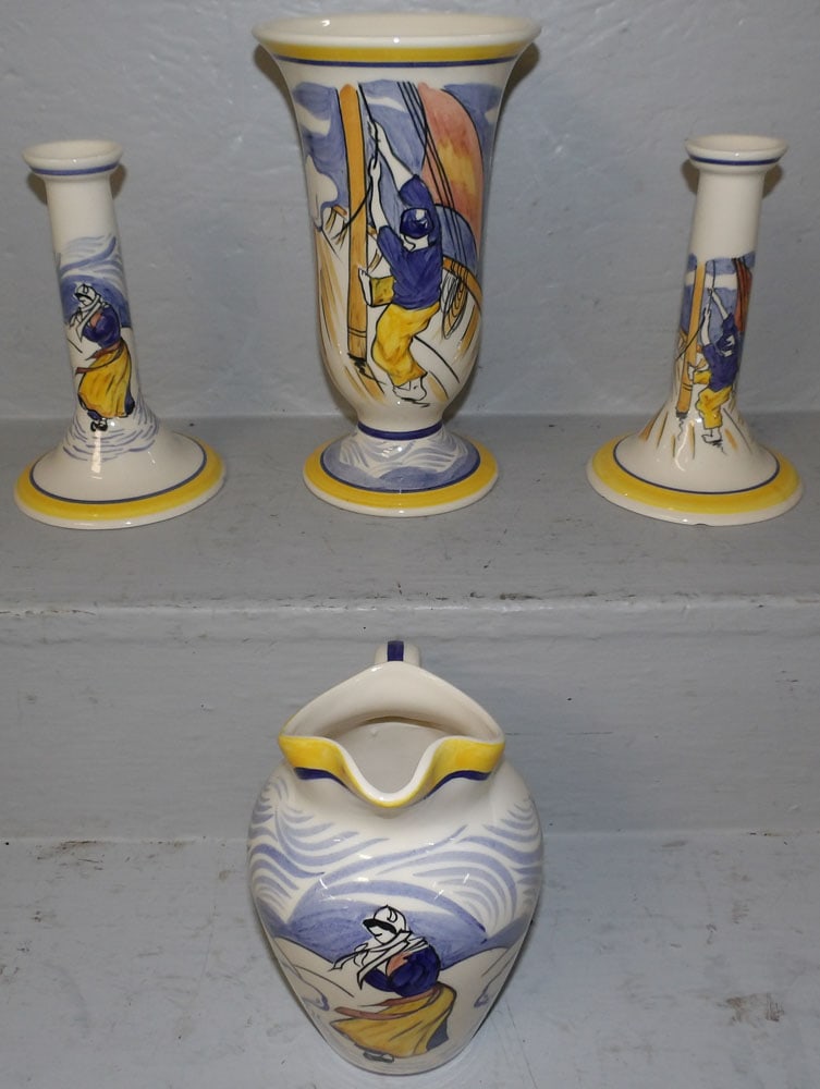 Four Pieces of Paint Decorated Quimper Pottery: Four Pieces of Paint Decorated Quimper Pottery . Up to 9 1/2" H 5 1/2" Dia. ALL DESCRIPTIONS AND ANY CONDITION STATEMENT GIVEN BY LANGSTON AUCTION GALLERY ARE STRICTLY OPINIONS AND LANGSTON'S SHALL HA
