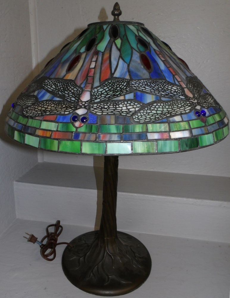 stain glass tiffany style lamp with dragonfly motif: stain glass tiffany style lamp with dragonfly motif . 26 1/2" H 20" Dia. ALL DESCRIPTIONS AND ANY CONDITION STATEMENT GIVEN BY LANGSTON AUCTION GALLERY ARE STRICTLY OPINIONS AND LANGSTON'S SHALL HAVE 