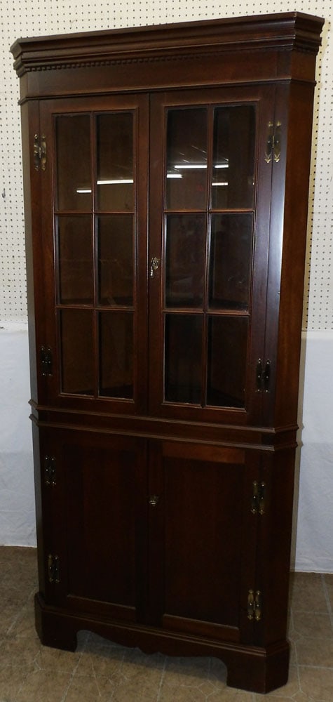 mahogany glass door corner cabinet by Craftique: mahogany glass door corner cabinet by Craftique . 80 1/4" H 37" W 17" D ALL DESCRIPTIONS AND ANY CONDITION STATEMENT GIVEN BY LANGSTON AUCTION GALLERY ARE STRICTLY OPINIONS AND LANGSTON'S SHALL HAVE N