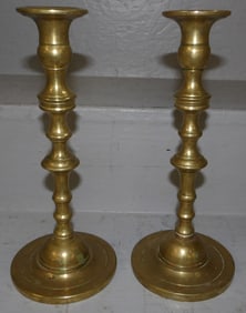 pair of antique cast brass candlesticks