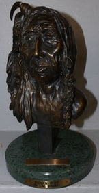 bronze native American bust on round marble base by C. M. Russell