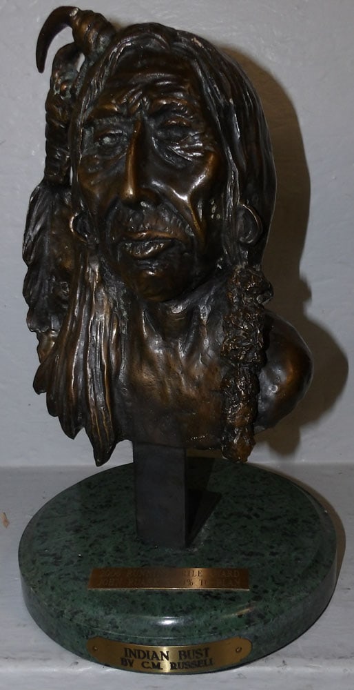 bronze native American bust on round marble base by  C. M. Russell (1 of 3)